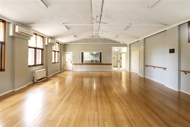 View of main hall looking towards the kitchen servery window