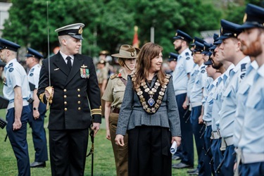 Cr Mayor Elizabeth Nealy inspects the parade alongside parade commanding officer.