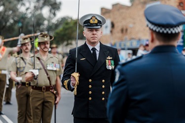Police challenges the military parade on Were Street.