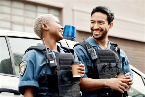 Police officers with coffee cups