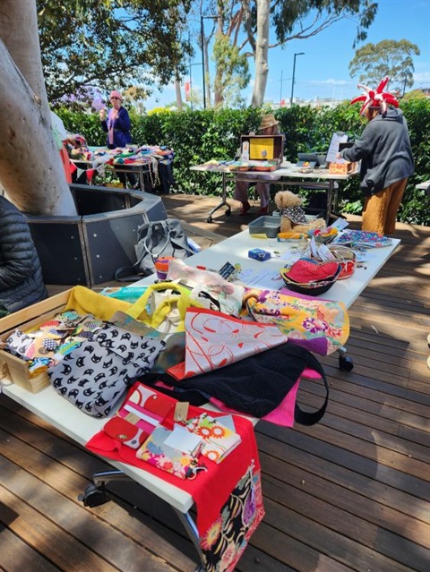 Arts and crafts for sale in front of ILCH